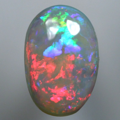 SOLID SEMI BLACK OPAL Rainbow of magenta, crisp red, green and violet